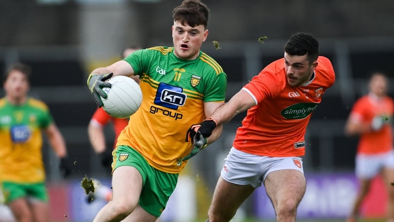 Niall O'Donnell of Donegal gets away from Conor O'Neill of Armagh
