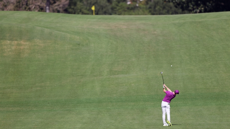 Rory McIlroy attacks the par-five eighth hole in two during his third round.
