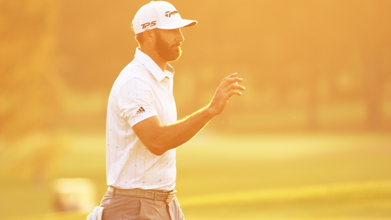 Dustin Johnson walks off the 18th green at Augusta after his third round.