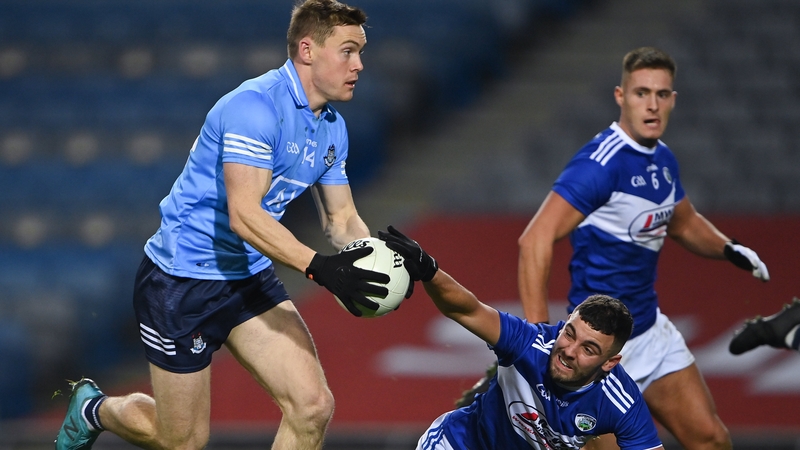 Con O'Callaghan evades Mark Timmons of Laois