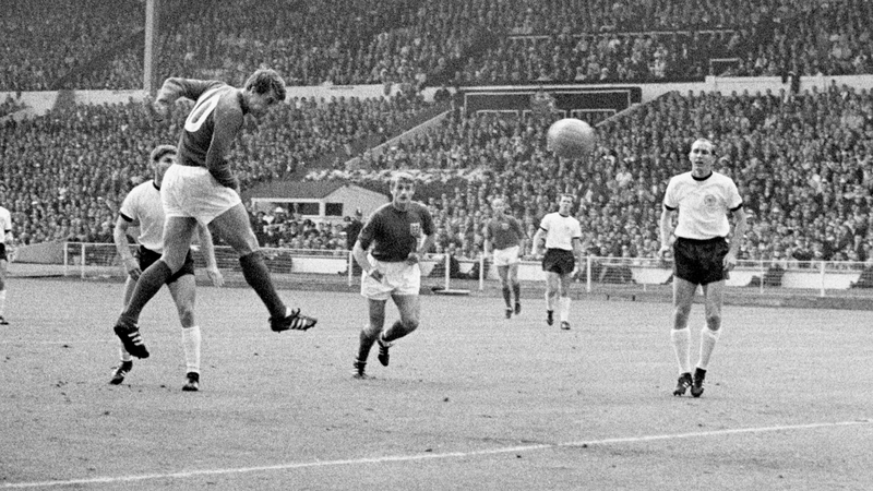 England's Geoff Hurst heads a goal against West Germany in the 1966 World Cup final