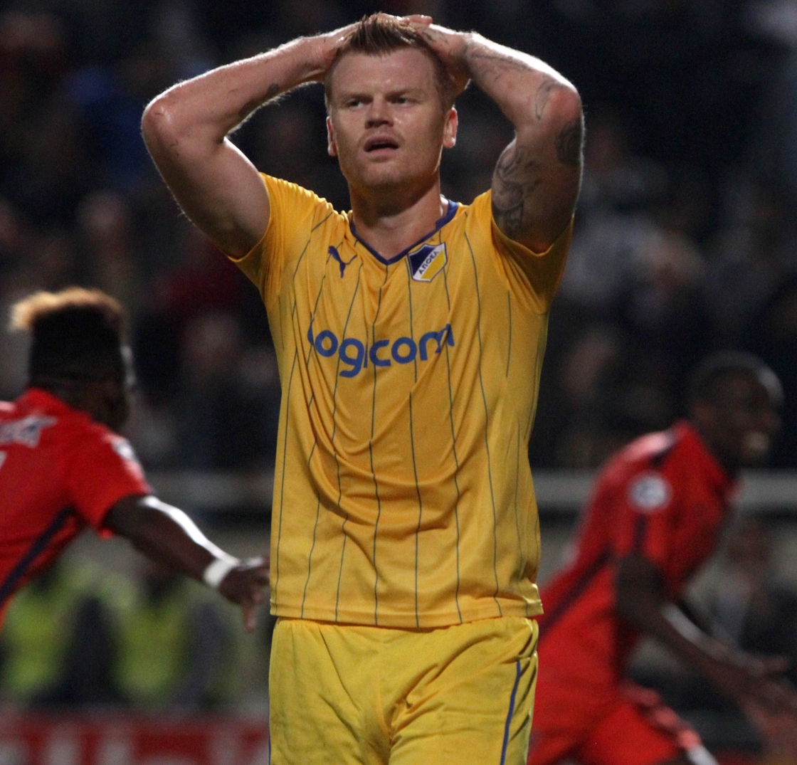 John Arne Riise in action for APOEL against PSG