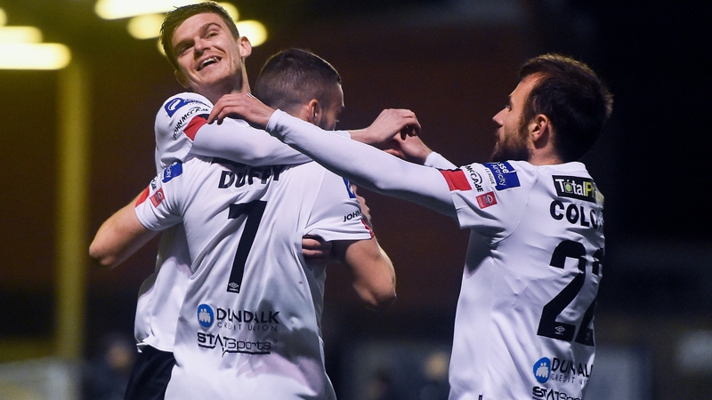 Sean Gannon and Stefan Colovic celebrate with Michael Duffy after his early opener at Dalymount Park