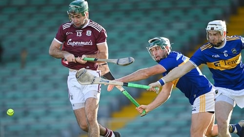 Brian Concannon of Galway in action against Cathal Barrett and Brendan Maher of Tipperary
