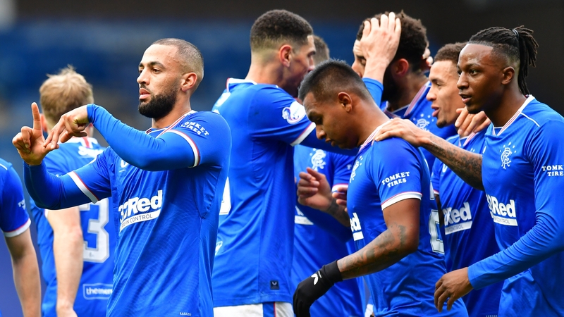 Kemar Roofe (L) celebrates his goal