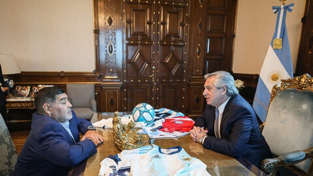 Argentinian President Alberto Fernandez in a meeting with Maradona in 2019