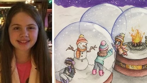 Abby O'Reilly's winning entry, showed groups of people celebrating Christmas in three snow globes, together but apart