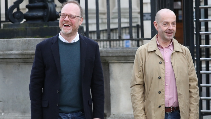 Trevor Birney (L) and Barry McCaffrey outside Belfast High Court today