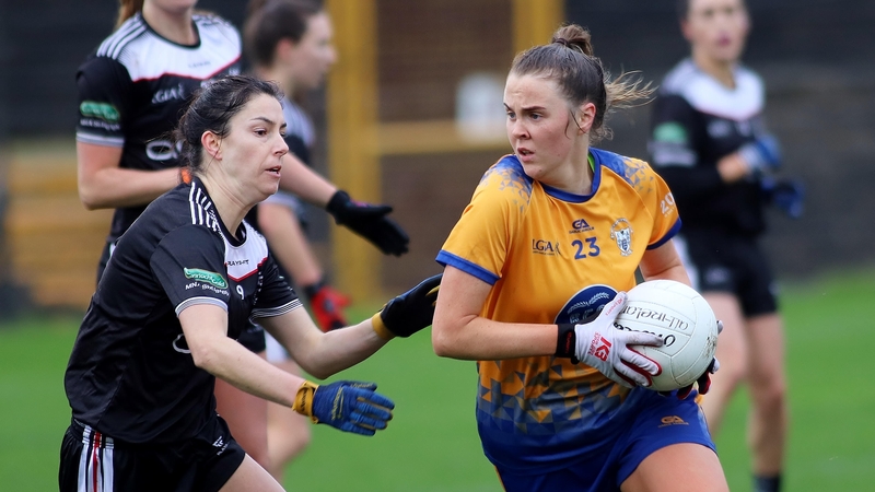 Clare's Chloe Moloney (right) powers past Sligo midfielder Louise Lindsay during the recent TG4 All-Ireland Intermediate Championship encounter at Tuam Stadium