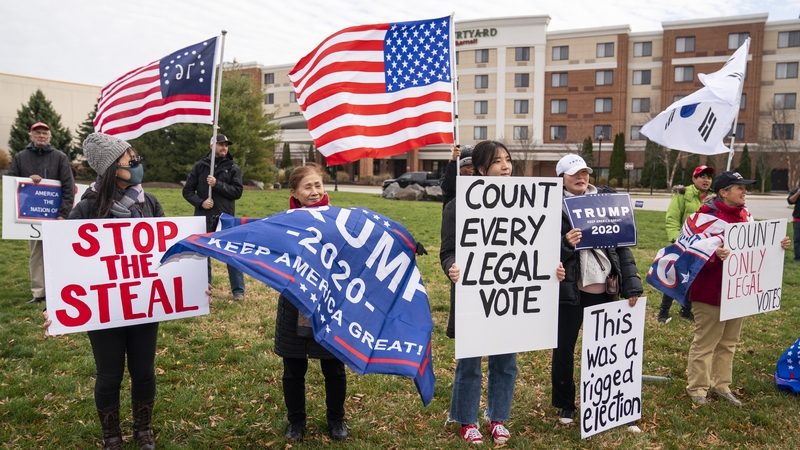 Supporters of Donald Trump outside a public hearing in Gettysburg, Pennsylvania