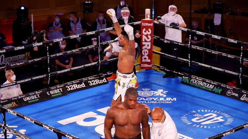 Referee Ian John Lewis takes Dubois away