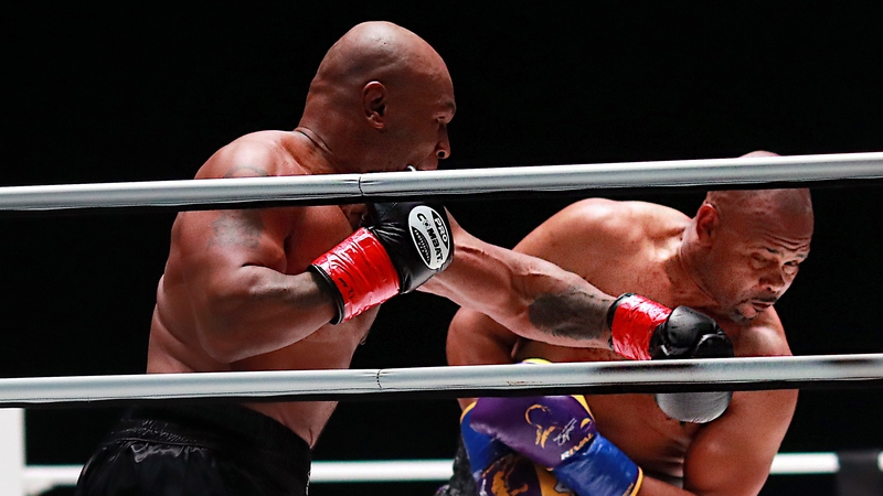 Tyson throws a punch in the third round