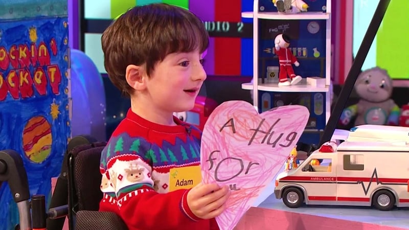 Adam King shows Late Late Toy Show host Ryan Tubridy his 'virtual hug'
