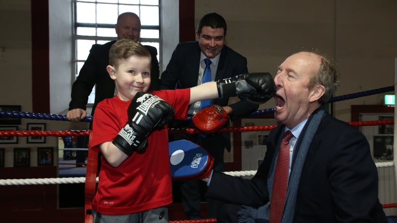King of the photo op: At Arbour Hill Boxing Club, Dublin, announcing the 2017 Sports Capital
Grants. Minister of State Brendan Griffin watches as a young member of the
club, Kalvin Keenan, lands a painful punch