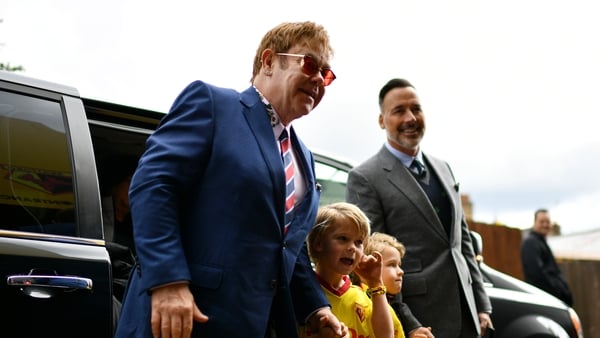Elton John and David Furnish and their two boys arriving for a Watford versus Manchester City encounter in 2017