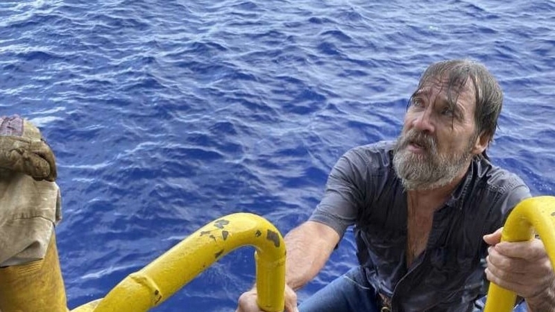 A passing container ship spotted Stuart Bee, who was reported missing and had held on to his upturned 10m vessel