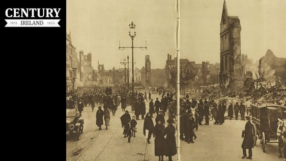 Century Ireland Issue 193 - People wandering around the still-smoking ruins of Cork city, recently …