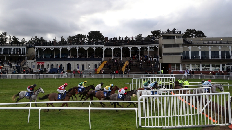 The runners and riders pass the grandstand at Ludlow