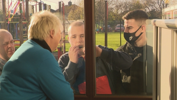 Jean Culleton gets a visit at her window from Peter