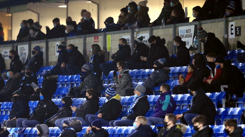 Socially distanced fans in the stands during the Sky Bet Championship match at Adams Park, Wycombe