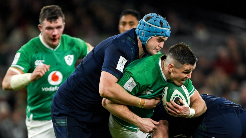 Jonathan Sexton of Ireland is tackled by Scott Cummings in February