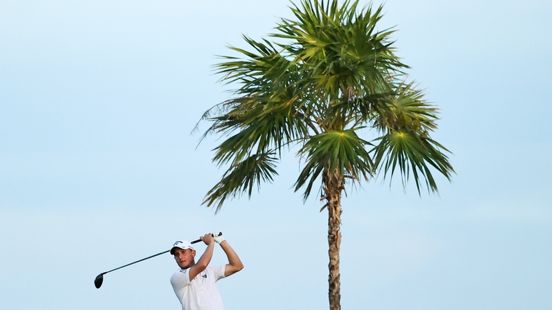 Emiliano Grillo of Argentina plays his shot from the 16th tee