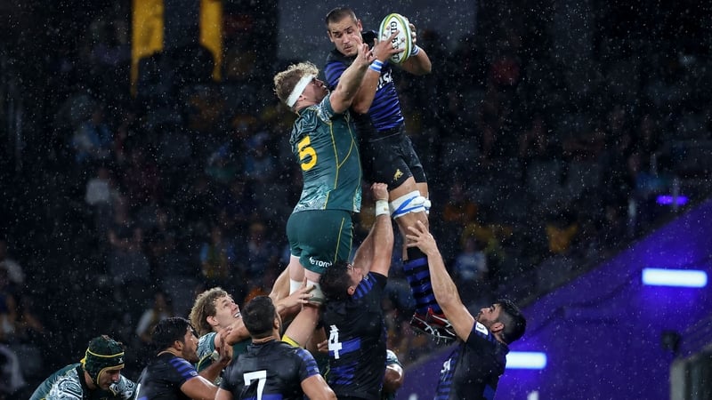 Argentina's Santiago Grondona (R) and Australia's Matt Philip fight for the ball in Sydney