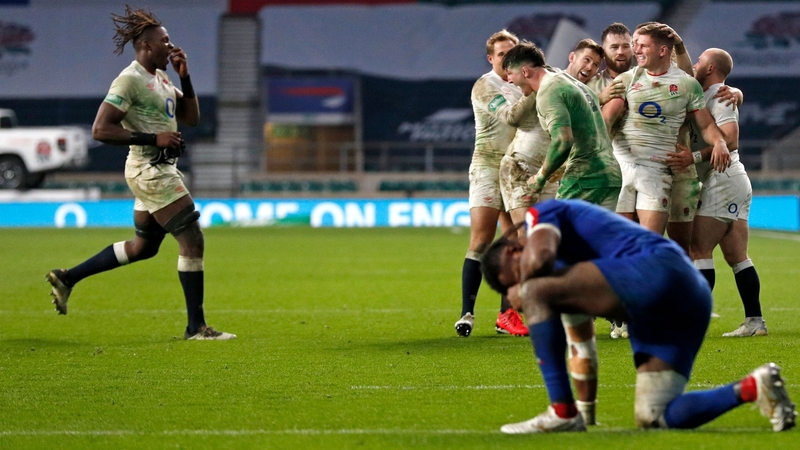 England players celebrate with centre Owen Farrell