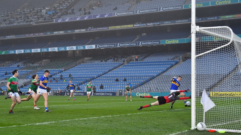 David Clarke makes a save from Michael Quinlivan