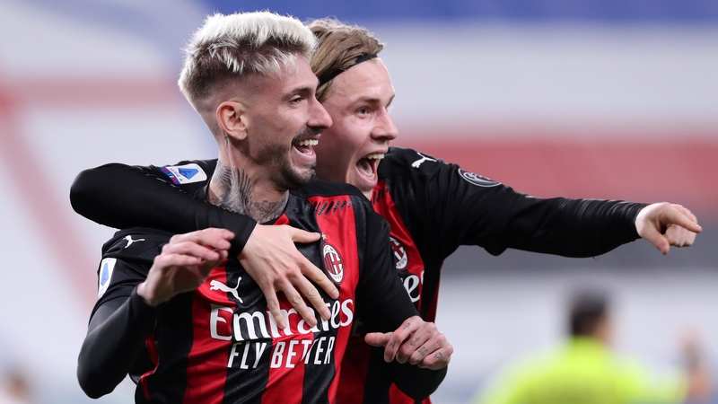 Samu Castillejo celebrates scoring AC Milan's second goal