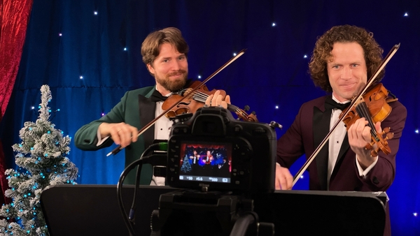 Vladimir Jablokov (R) and his brother Anton perform for Maura Murray