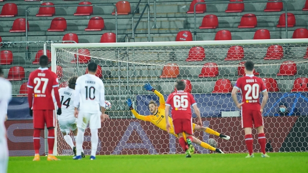 Alexander Scholz fires past Caoimhin Kelleher from the penalty spot