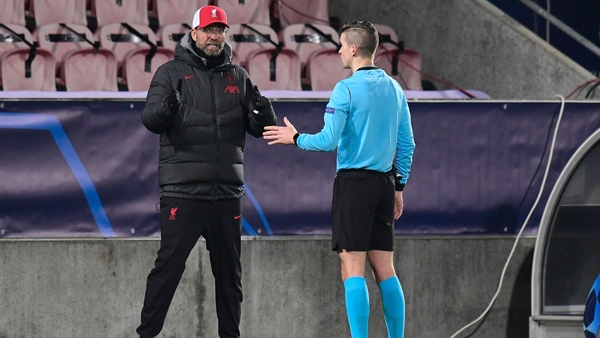 French referee François Letexier talks to Jurgen Klopp during the 1-1 draw with Midtjylland