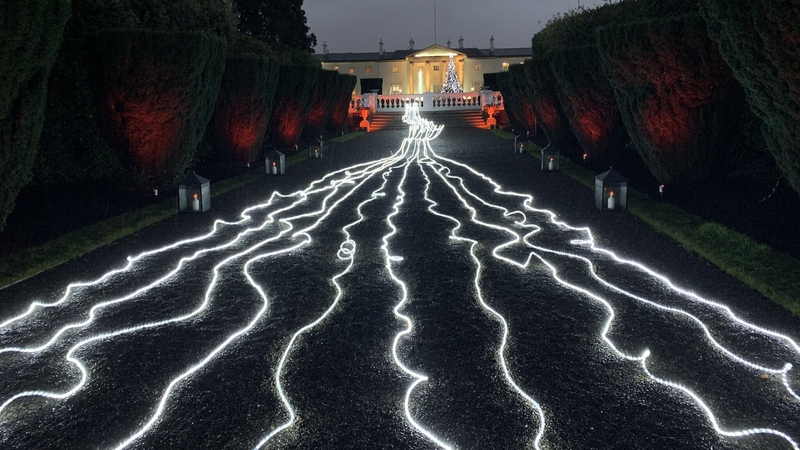 A stream of light pouring out of the lantern for the diaspora is part of the Christmas lights at Áras an Uachtaráin