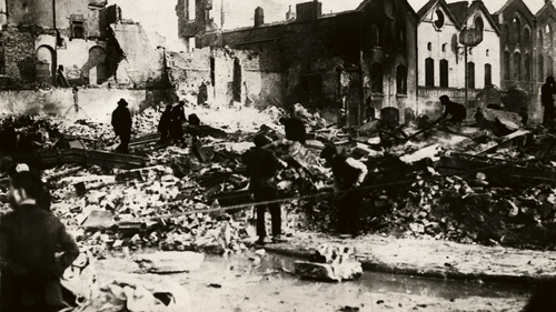 People cleaning up the destruction from the burning of Cork by British forces in December 1920. Photo: 
George Rinhart/Corbis via Getty Images
