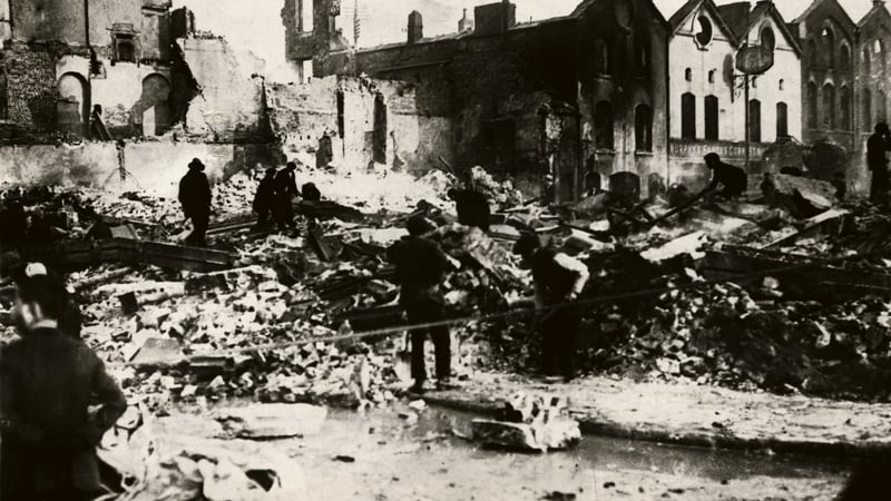 People cleaning up the destruction from the burning of Cork by British forces in December 1920. Photo: 
George Rinhart/Corbis via Getty Images