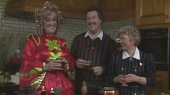 Frank Kelly, Ronan Collins and Denise Sweeney in the 'Christmas Company' studio (1985)