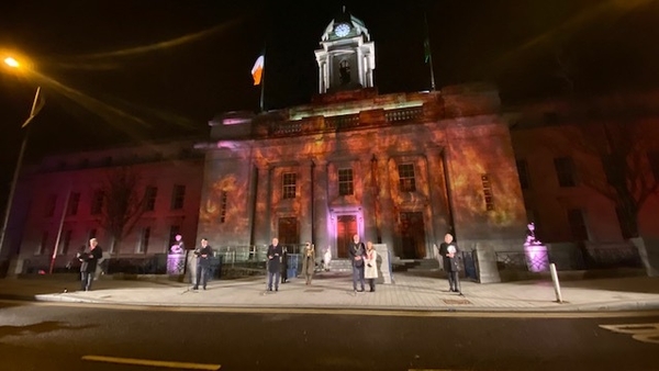 Lights near City Hall were dimmed at 10.30pm to mark the moment the first building was reportedly torched