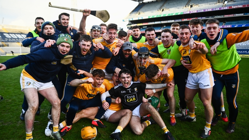 Antrim players celebrate their Joe McDonagh success