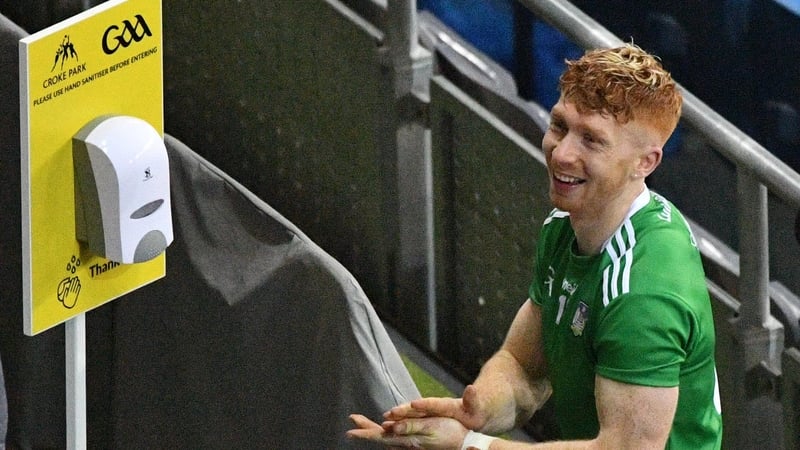 Cian Lynch sanitises his hand before lifting the Liam MacCarthy Cup on Sunday