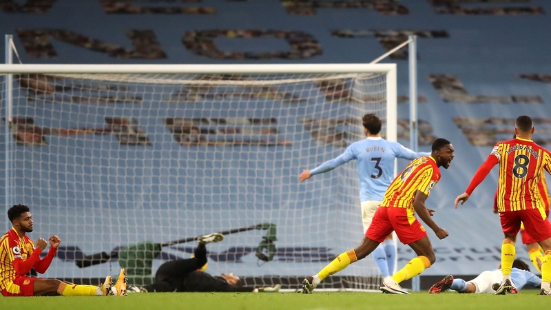 WBA defender Semi Ajayi (2R) celebrates after scoring