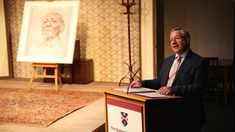 David Grant and, on left, the portrait of Brian Friel by Anthony Palliser
