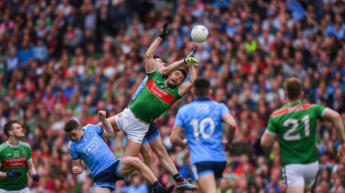 Aidan O'Shea of Mayo and Michael Darragh Macauley of Dublin contesting a high ball last year
