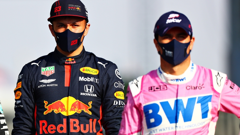 Alex Albon and Sergio Perez (r) at the end of the 2020 season