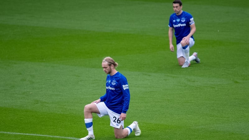 Ireland and Everton captain Seamus Coleman and Tom Davies (L)