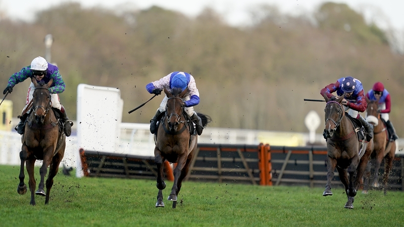 Aidan Coleman riding Paisley Park (R, spotted cap) clear the last to win the Ascot feature