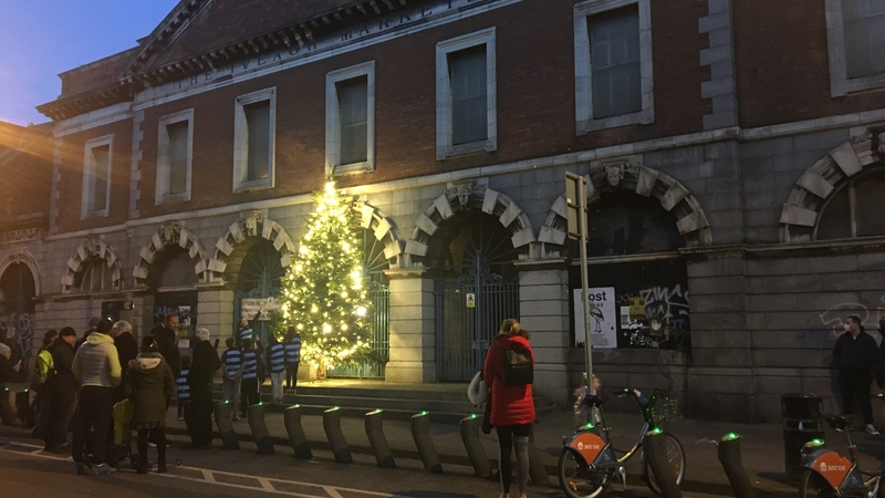 The ceremony revives a tradition of a tree being placed outside the Iveagh Markets
