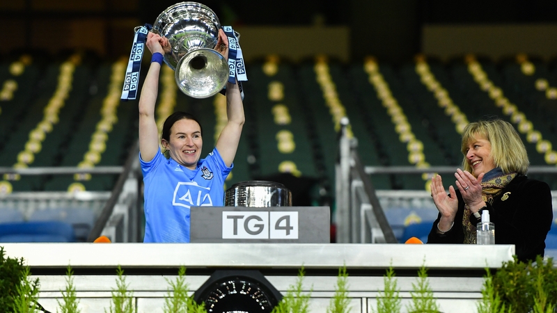 Dublin captain Sinéad Aherne hoists the Brendan Martin Cup aloft