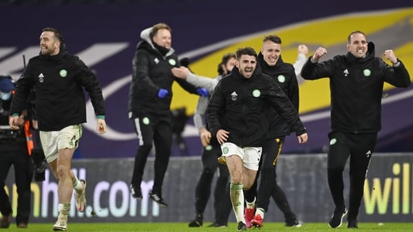 Shane Duffy (L) celebrates at the end of the Cup final shootout.
