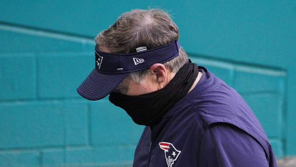 New England Patriots head coach Bill Belichick walks off the field after the loss against Miami